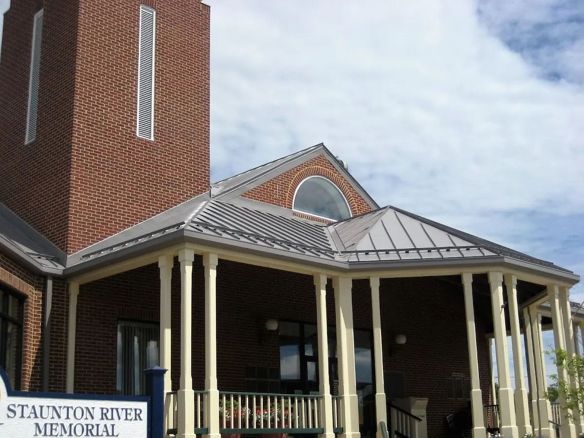 Skilled roofing craftsmen working on a residential roof in Johnstown